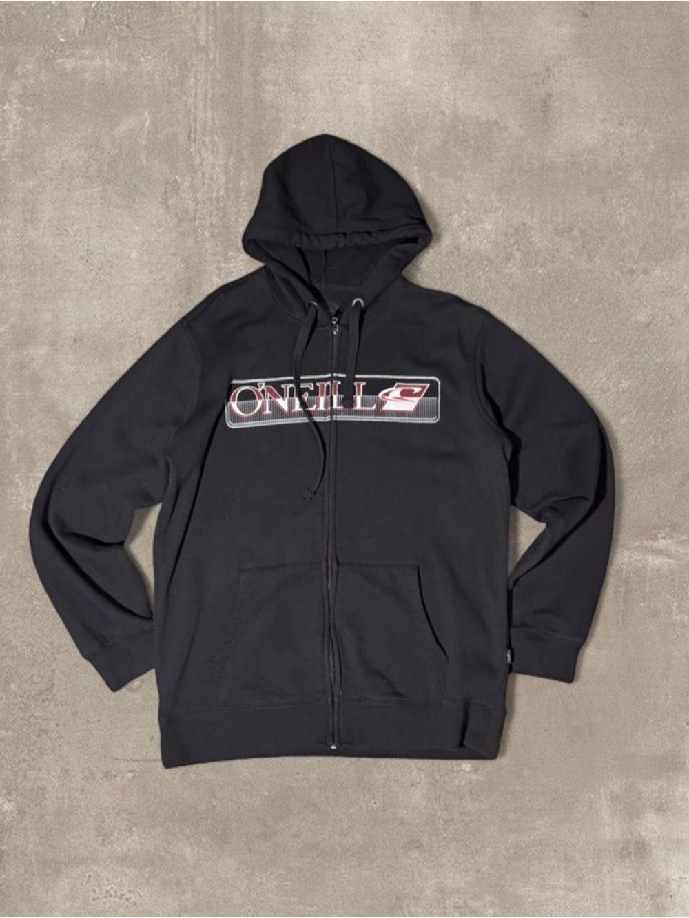 Black O'Neill zip up hoodie with white and red logo